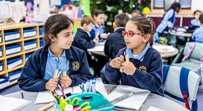 Girls having fun in class at St Margaret Mary's Primary Merrylands